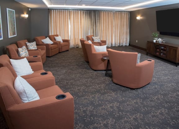 Media Room With Theater Chairs, Surround Sound at The Legends of Columbia Heights 55+ Living, Columbia Heights, Minnesota