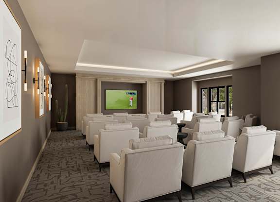 A conference room with white chairs and a screen on the wall at Orchard Springs 55+ Apartment, Surprise, AZ, 85374