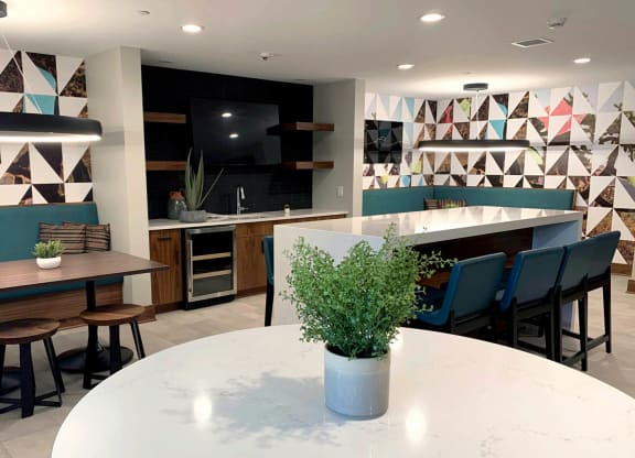 Community room area with couch at Preserve at Shady Oak Apartments, Minnetonka , MN 55343