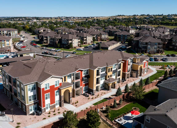 an aerial view of an apartment complex in a city
