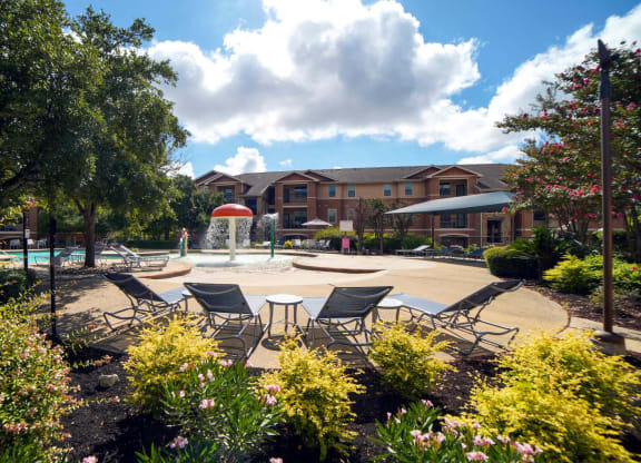 Poolside Relaxing Chairs at Stoneridge Apartments, Texas, 78660
