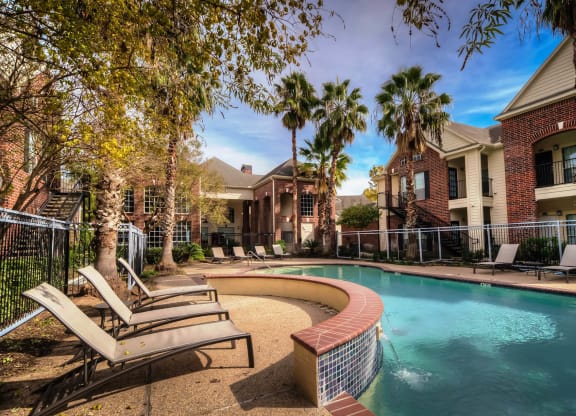 Pool With Relaxing area at Villa Springs, Houston, Texas