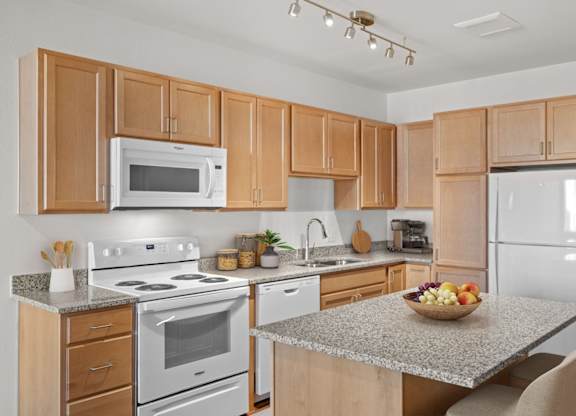 Staged Kitchen at The Addie at Metro Center 55+ Apartments, Aurora, CO 80012