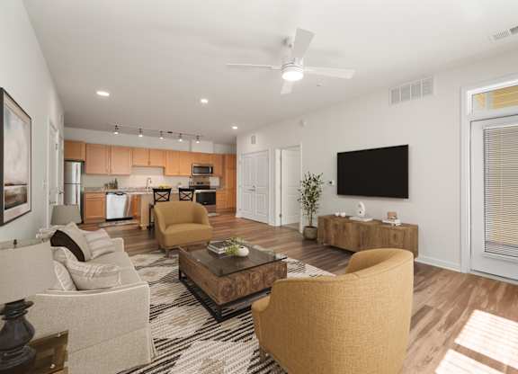 Living room with couch at Creekridge on the Park Apartments, Charlotte, NC