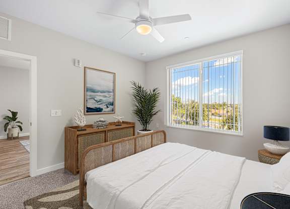 Bedroom With Expansive Window at Heron Ridge 62+ Apartments, Florida