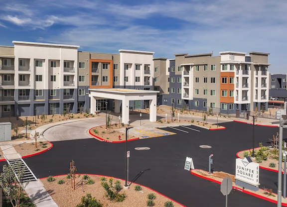 A modern apartment complex named Tunper Square is shown in the image.