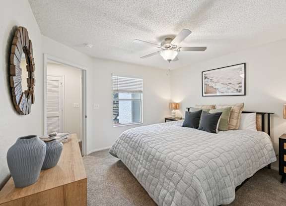 Bedroom With Ceiling Fan at The Lucille Apartments, Stuart, FL
