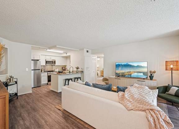 Living Room With Kitchen at The Lucille Apartments, Stuart, FL