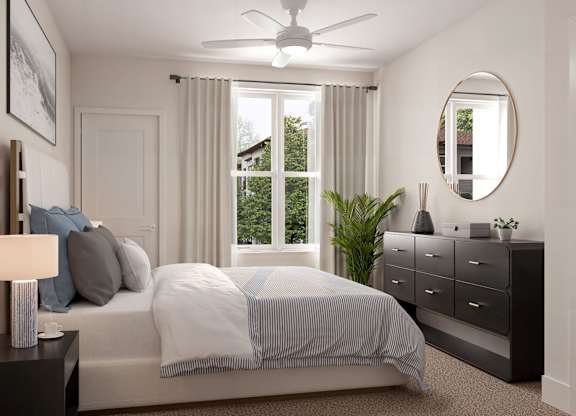 A bedroom with a bed, nightstand, and a window with curtains at Maison at Solivita Marketplace Apartment Homes, Kissimmee