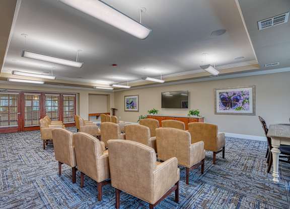 a conference room with chairs and a table at Mariposa at South Broadway, TX 76058
