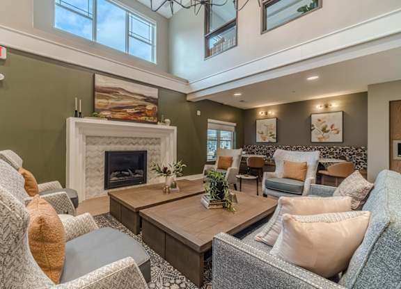 A living room with a fireplace and a couch.
