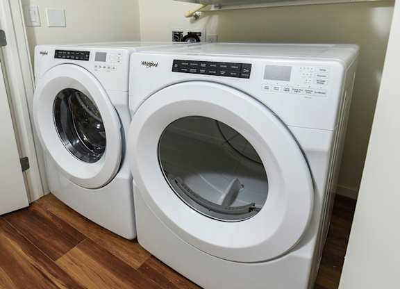 Laundry Room at Suncrest Vista at Canyon Trails 55+ Apartments, Goodyear, AZ, 85338