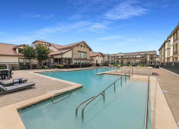 Outdoor Swimming Poolat The Portofino 55+ Apartments, Pasadena, TX 77503