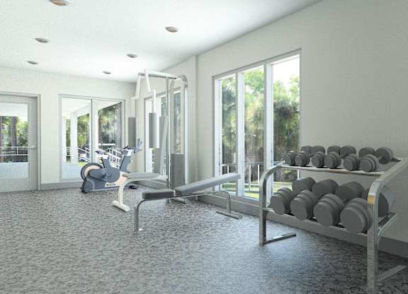 A gym with a bench, weights and a bag.