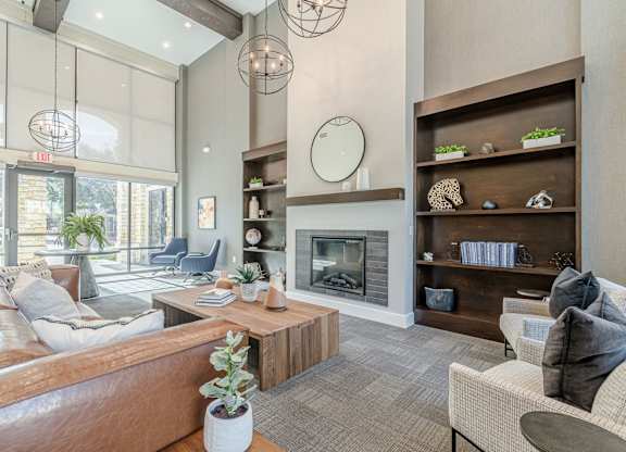 A living room with a fireplace and a couch.