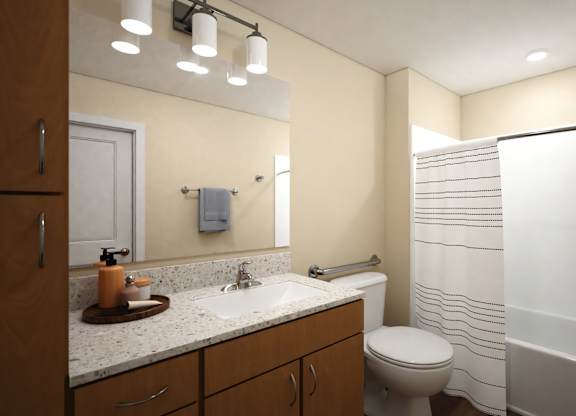 A bathroom with a toilet, sink, and bathtub.