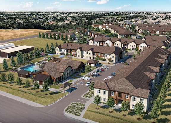 A bird's eye view of a residential area with houses and a swimming pool.