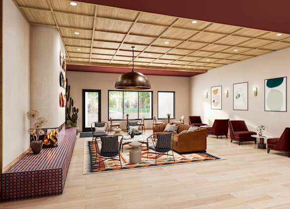 Clubhouse lounge with fireplace and contemporary furnishings at Turquoise Trail Apartments, Santa Fe, NM