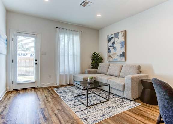 a living room with a couch and a coffee table