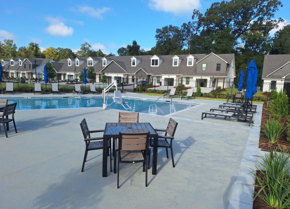 our apartments have a pool and a dining table