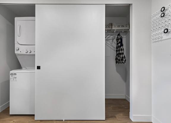 A white oven and fridge in a small kitchen.