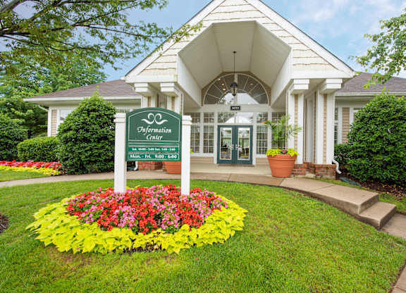 A white building with a sign that says "Springside Center".