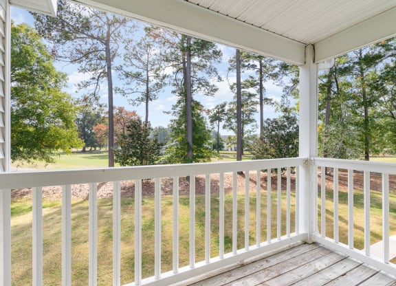 a view of the yard from the porch of a home