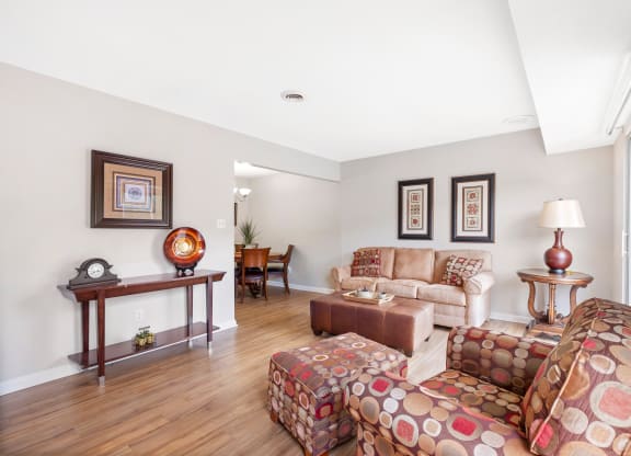 a living room with a couch and a chair