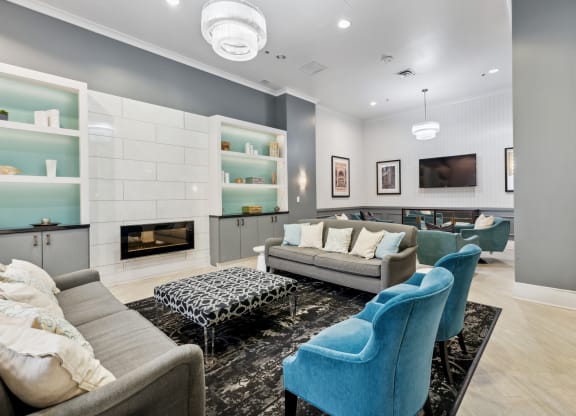a living room filled with furniture and a fire place