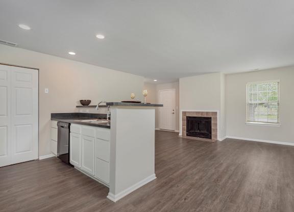 Kitchen with a white island at Camden Place Apartments, Dublin, OH, 43016