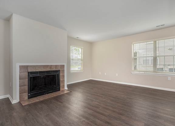 Living room with a fireplace at Camden Place Apartments, Dublin, 43016