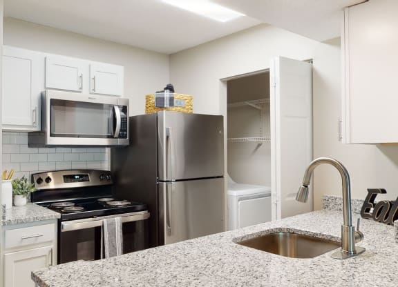 Kitchen with White Cabinets  at Arbor Ridge, North Carolina