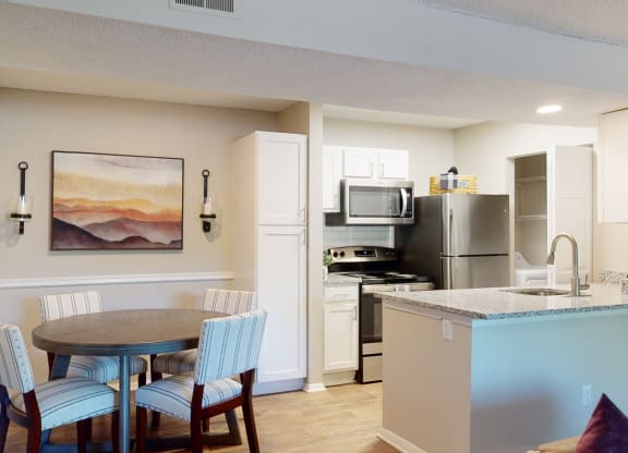 Kitchen and Dining Area in a 555 waverly unit  at Arbor Ridge, North Carolina, 27410