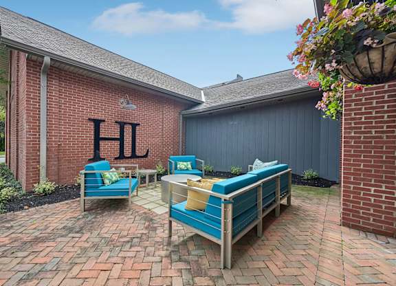 A red brick building with the letters HL on it.
