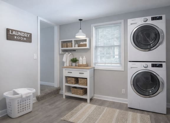 A laundry room with a washer and dryer.