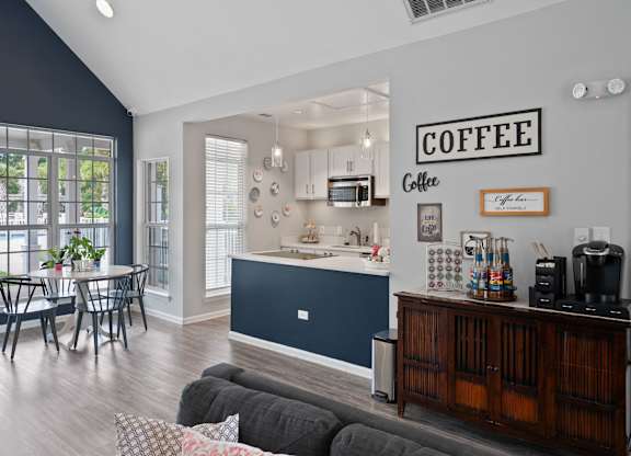 A kitchen with a coffee sign on the wall at Litchfield Oaks Apartments in Pawleys Island, SC, 29585