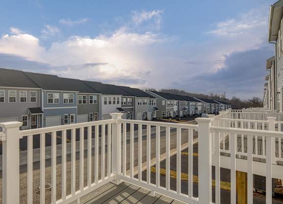 Building with balconies and a sidewalk at The Mark, Virginia