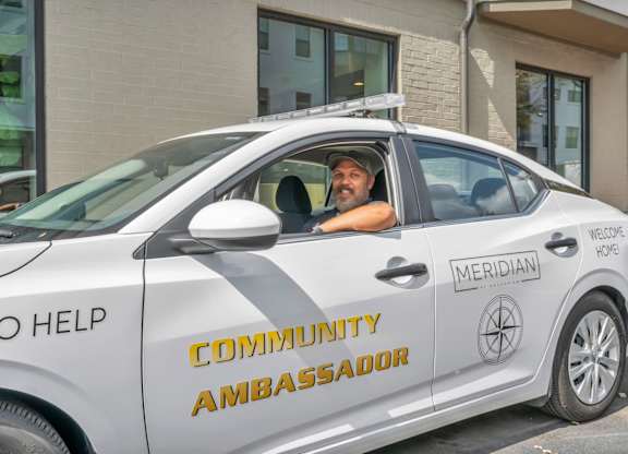 A white car with the words