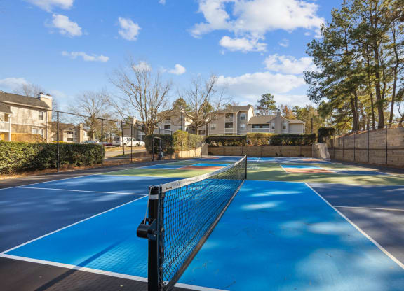 a tennis court with a net on top of it