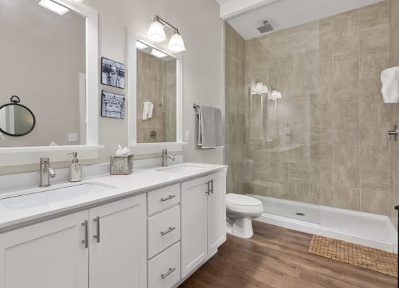 a bathroom with a sink and a shower and a toilet at Hayden Lofts, Dublin, Ohio