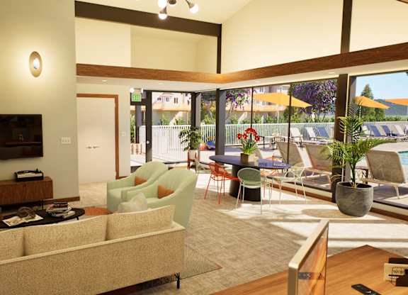 A living room with a couch, chairs, and a television.