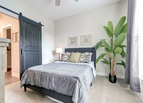 Bedroom at The Delaneaux Apartments in New Orleans LA