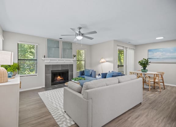 a living room with a couch and a fireplace