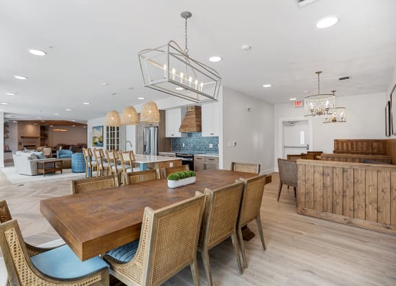 a large dining room with a wooden table and chairsat Oak Grove at Blake Farm, North Carolina