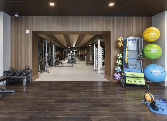 a view of the fitness center with weights and other exercise equipment in a building withat Preston Centre, Ohio, 43215