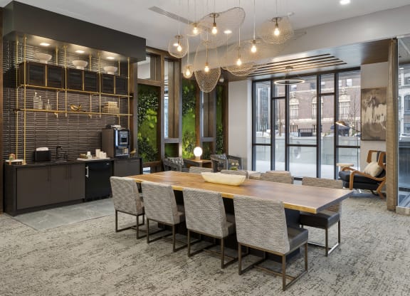 a dining room with a wooden table and chairs at Preston Centre, Columbus
