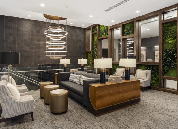 the lobby of a hotel with a reception desk and couches at Preston Centre, Ohio
