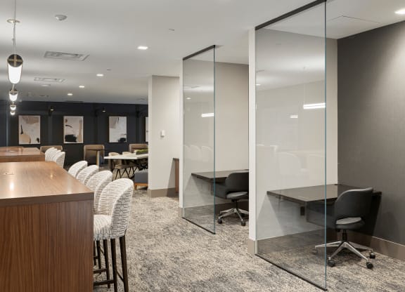 a conference room with white walls and glass doors at Preston Centre, Ohio