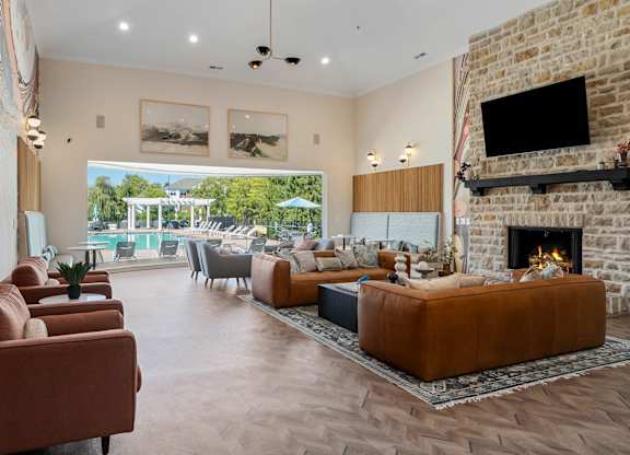 Clubroom with cozy seating, fireplace and television. at The Orchard, Dublin