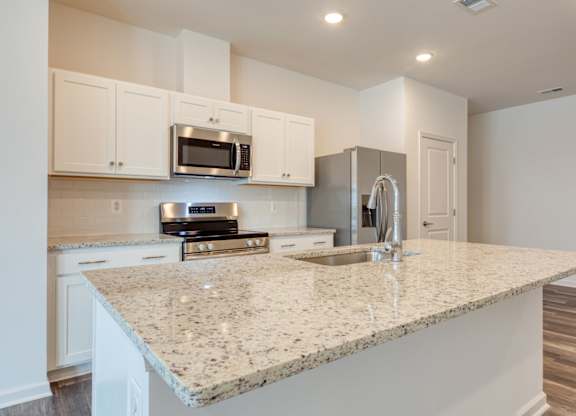 White Cabinetry And Appliances In Kitchen at The Mark, Virginia